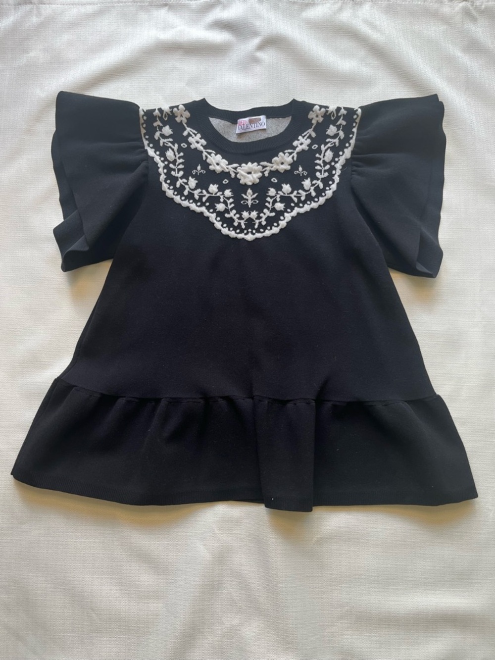 RED Valentino flutter sleeve top with coquette balletcore and luxe chic vibes
